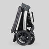 Chicco Bravo 3-in-1 travel system with quick-fold stroller, KeyFit 30 infant car seat and base in Camden/Black, showing car seat and stroller setup.