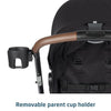 Maxi-Cosi Zelia™ Luxe 5-in-1 modular travel system with stroller, car seat, and accessories in a sleek design.