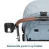 Maxi-Cosi Zelia Luxe 5-in-1 modular travel system with stroller and car seat, featuring adjustable handle and stylish design.