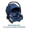 Maxi-Cosi Zelia Luxe 5-in-1 modular travel system with stroller, car seat, and accessories in a cityscape setting
