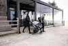 Thule Spring 2 single child stroller with ventilated canopy, adjustable handlebar, lightweight frame, and compact fold for easy transport.