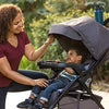 Pink Baby Trend Passport Cargo Stroller with EZ-Lift Plus infant car seat, featuring a pink bamboo pattern, suitable for travel.