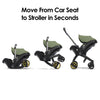 My Store Doona car seat and stroller in slate green, all-in-one travel system with adjustable handle and safety harness.