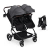 Pink double stroller for newborn and toddler with adjustable recline, canopy, lightweight fold, and parent cup holders.