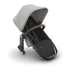 UPPAbaby RumbleSeat V3 second lower all-weather seat in Declan oatmeal with silver frame and chestnut leather, with magnetic buckle and adapters.