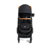 Joie Ginger and Mint Latch Travel System in Shale Dark with infant car seat, stroller, and all-terrain wheels for easy travel.