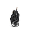 Joie Nutmeg compact stroller in shale color, lightweight design with one-hand fold, suitable for easy travel and daily use.