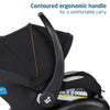 Maxi-Cosi Zelia Luxe 5-in-1 modular travel system with stroller and car seat, featuring adjustable handles and fabric details.