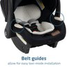 Maxi-Cosi Zelia Luxe 5-in-1 modular travel system with stroller and car seat, featuring adjustable handle and fabric details.