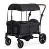 Evolur Trailblazer double stroller wagon in black with all-terrain wheels, 5-point harness, removable canopy, and spacious storage.