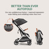 Bombi Bēbee V2 lightweight baby stroller with XXL canopy, vegan leather accents, aluminum frame, and one-hand fold in Hickory color.
