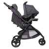 Pink Bamboo Baby Trend Passport cargo stroller travel system with EZ-Lift Plus infant car seat, featuring a pink fabric design.