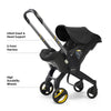 My Store Doona car seat and stroller in slate green, all-in-one travel system with adjustable handle and safety harness.