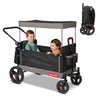 Red Radio Flyer wagon for kids with wheels, convertible toddler stroller and rolling beach cart for children aged 1+ years.