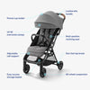 Graco Ready2Jet compact travel stroller with automatic fold, overhead-friendly design, in Kingston color, displayed outdoors