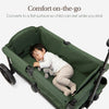 Evolur Trailblazer double wagon stroller in black with all-terrain wheels, foldable canopy, 5-point harness, and spacious storage.