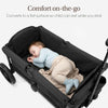 Evolur Trailblazer double stroller in black with all-terrain wheels, foldable design, 5-point harness, removable canopy, and spacious storage.