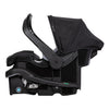 Baby Trend Passport cargo stroller travel system with pink bamboo infant car seat, featuring EZ-Lift™ Plus handle for easy transport.