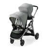 Graco Ready2Grow 2.0 double stroller with bench seat and standing platform, featuring sleek design and versatile seating options.